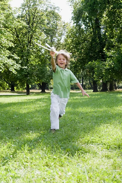 Niño Con Avión Juguete —  Fotos de Stock