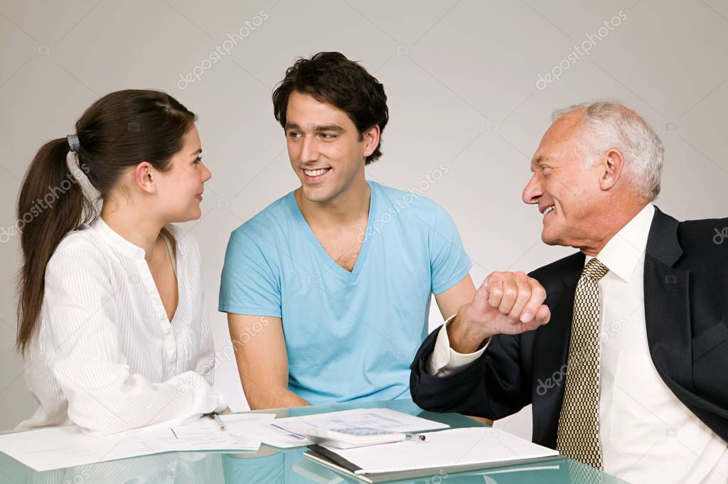 Couple and financial adviser