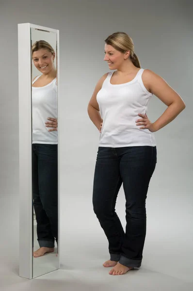 Overweight Caucasian Woman Looking Mirror Grey Background — Stock Photo, Image
