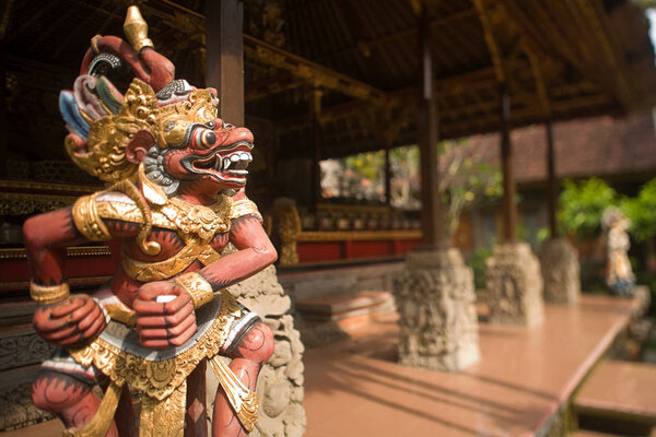 traditional wooden statue at Ubud palace, Indonesia 