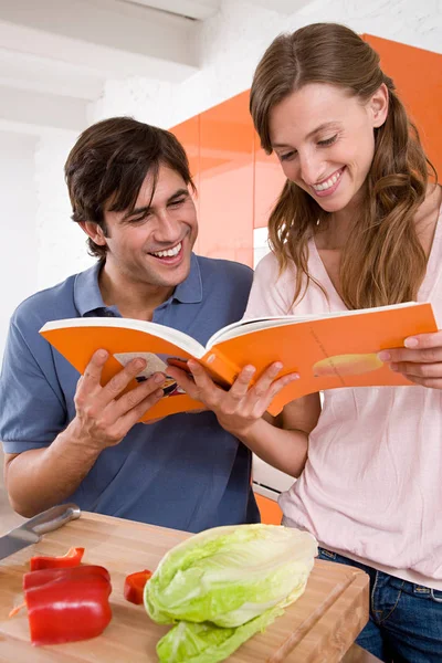 Young Attractive Caucasian Couple Reading Cookbook Together Kitchen — Stock Photo, Image