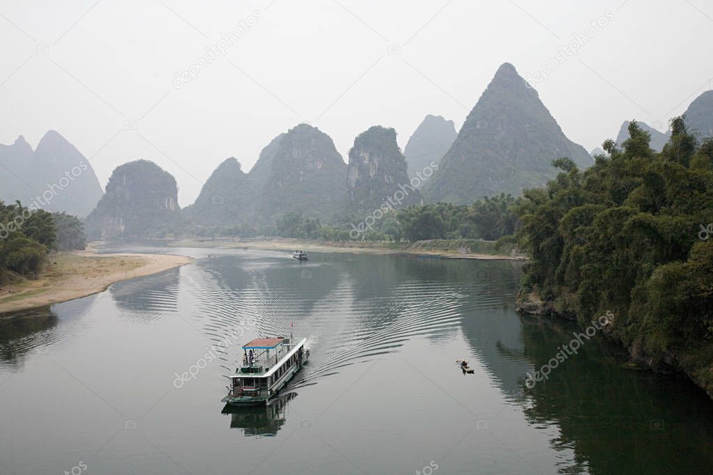 Scenic view of Boat on lijiang river