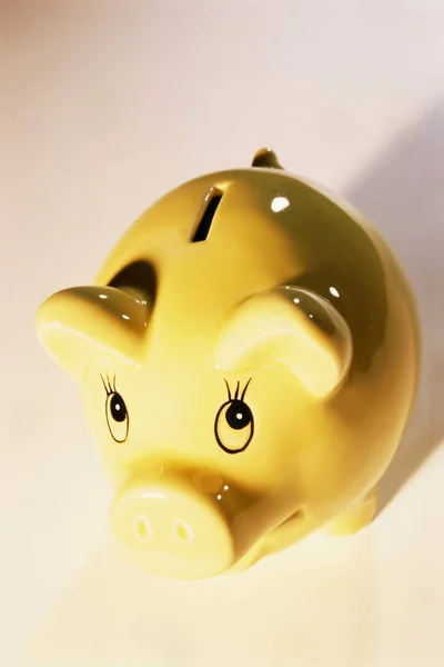 Close View Yellow Piggy Bank Shadow White Surface — Stock Photo, Image