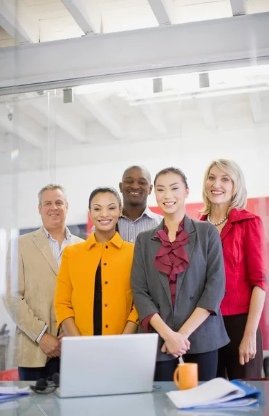 Business people smiling in office