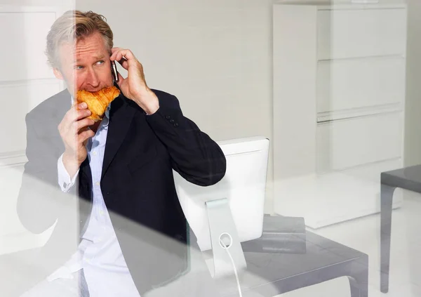 Mature Caucasian Handsome Man Office Eating Croissant — Stock Photo, Image