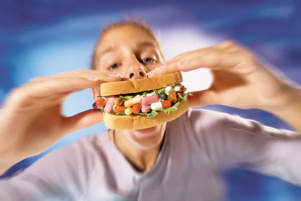 Woman Eating Sandwich Pills — Stock Photo, Image