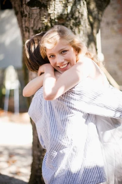 Young Couple Hugging Outdoors — Stock Photo, Image