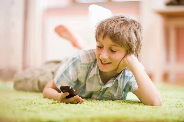Little Caucasian Boy Lying Floor Using Mobile Phone — Stock Photo, Image
