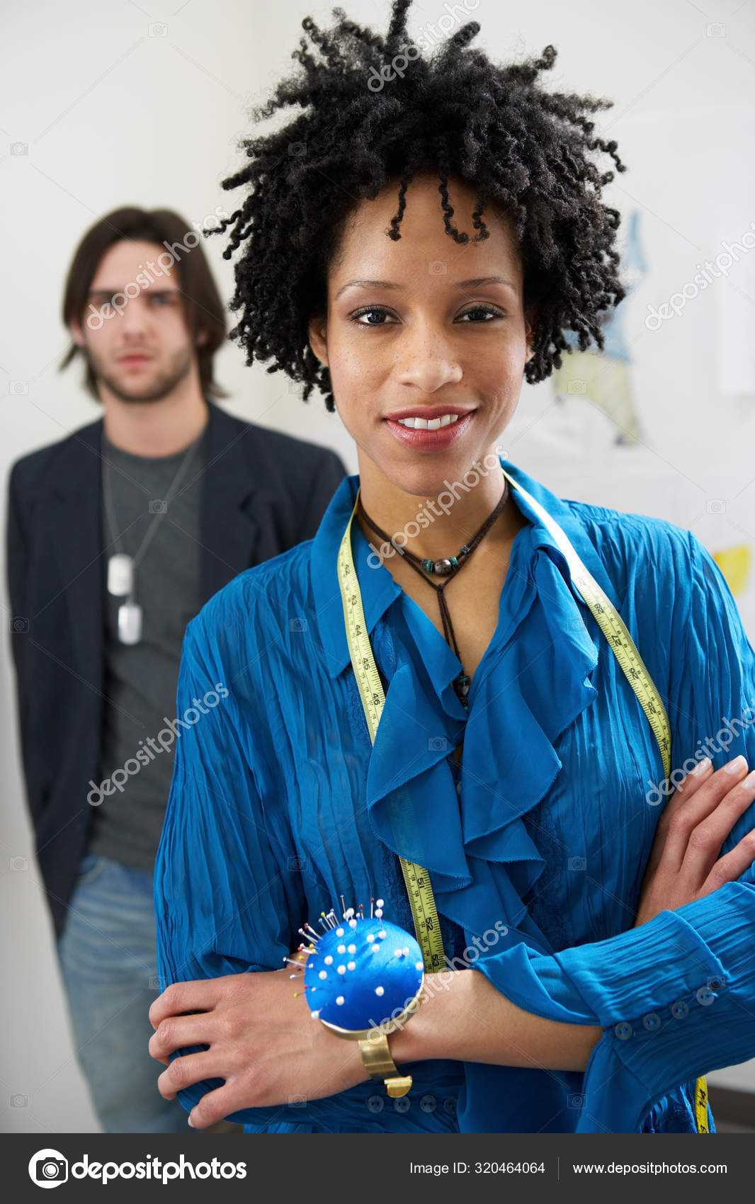 Fashion Designers Looking Camera Stock Photo by ©ImageSource 320464064