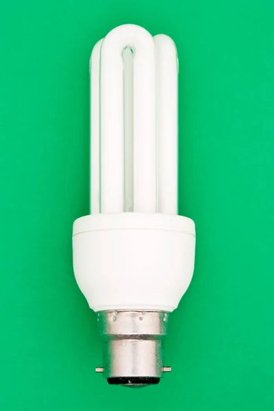 Energy Saving Lightbulb Green Background — Stock Photo, Image