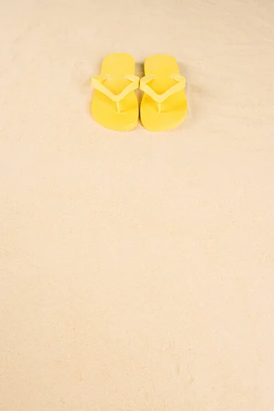 Yellow Flip Flops Sand — Stock Photo, Image