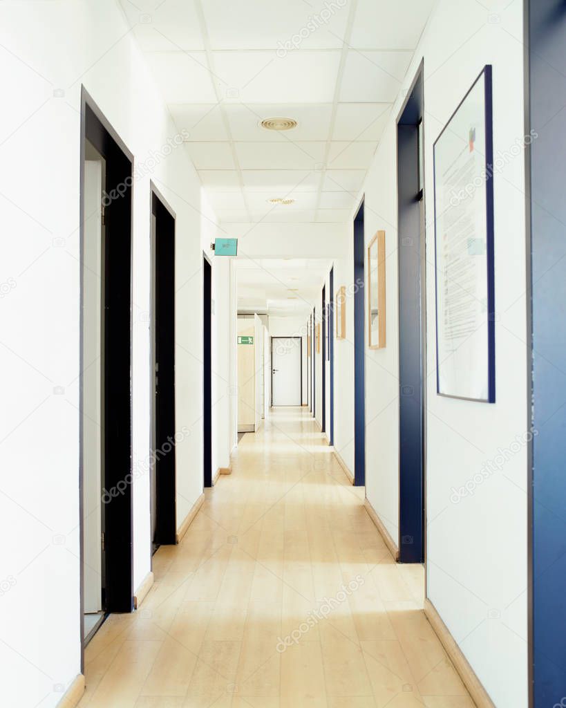 Hospital corridor with white walls 