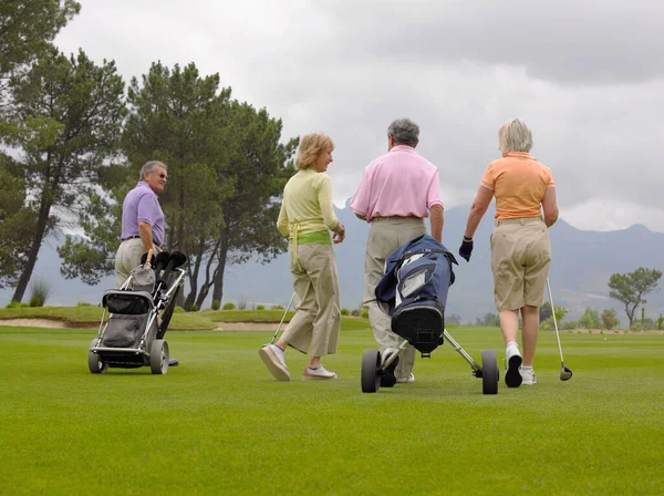 Golfers walking. Active sport concept