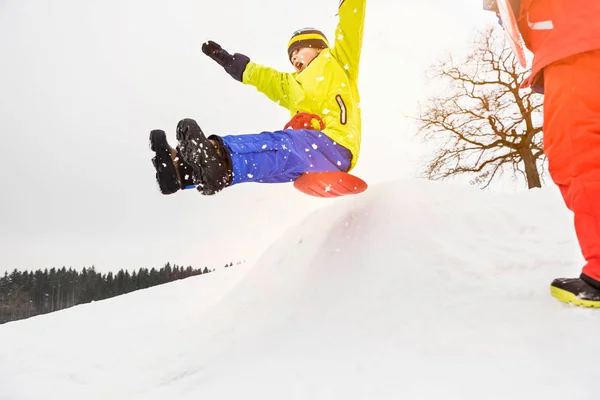 Boy Sledging Bump Snow — Stock Photo, Image
