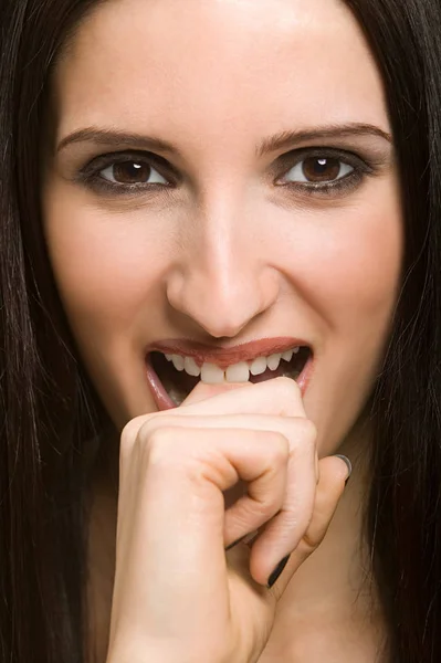 Woman Biting Her Finger — Stock Photo, Image