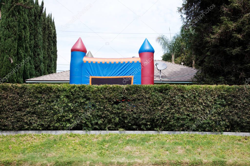 Inflatable bouncy castle on suburban street