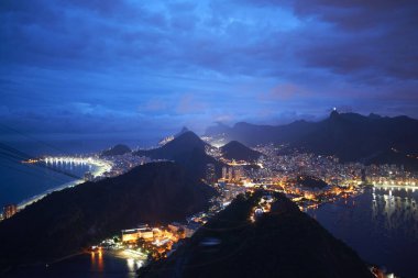 Night view of harbor and coast from sugar loaf mountain, Rio De Janeiro, Brazil clipart