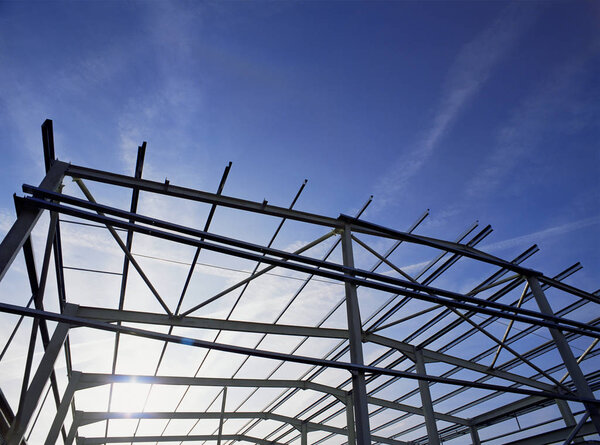 Building framework over blue sky 