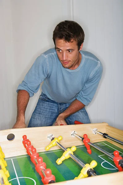 Man Playing Table Football — Stock Photo, Image