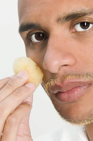 Man Using Sponge His Face — Stock Photo, Image