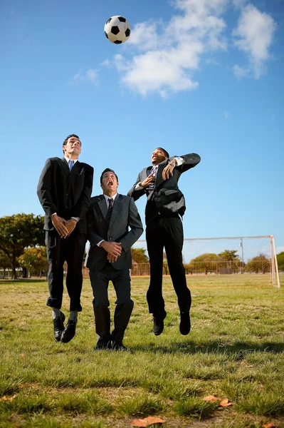 Empresários Saltando Para Futebol Fundo Conceito Negócio — Fotografia de Stock