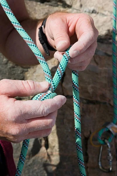 Rock Climber Knotting Rope — Stock Photo, Image