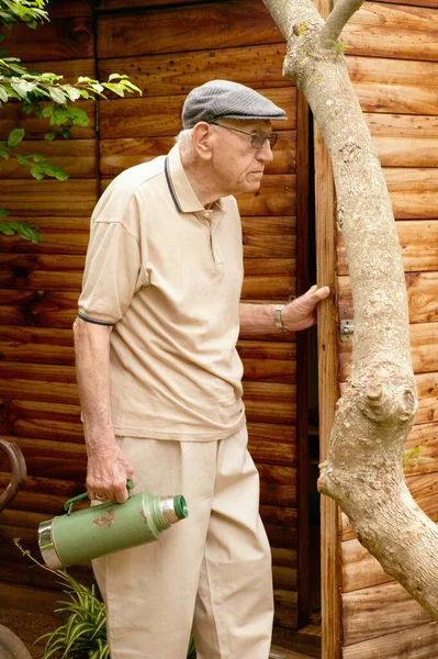 Senior Man Holding Drinks Flask — Stock Photo, Image