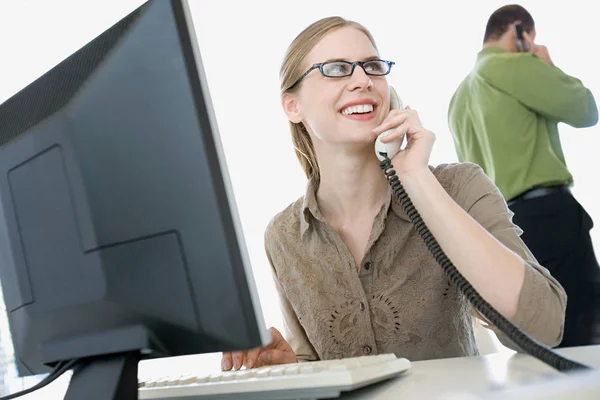 Woman on telephone in an office