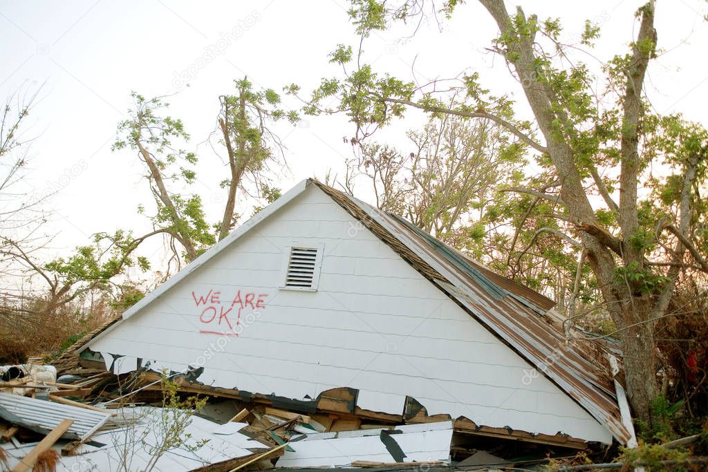 Upper level of residential house on ground amidst wreckage, aftermath of Hurraine Katrina, Biloxi, USA