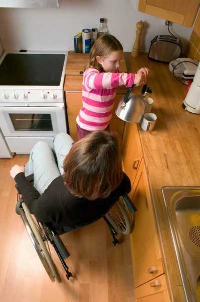 Disabled Mother Daughter Kitchen — Stock Photo, Image