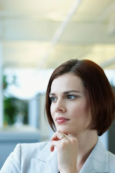 close-up portrait of Thoughtful looking businesswoman