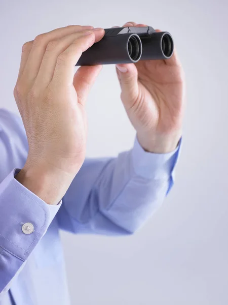 Person Holding Binoculars Posing White Background — Stock Photo, Image