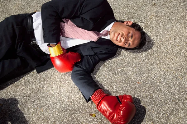 close-up portrait of Businessman unconscious on floor