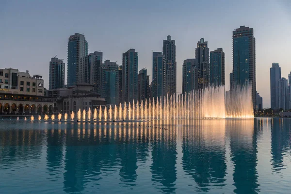 Sunlit fountains in lake, Dubai, United Arab Emirates — Stock Photo, Image