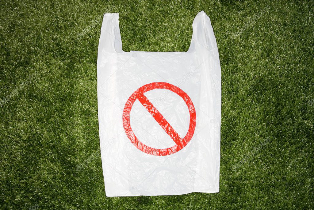 A plastic bag with a warning sign on it