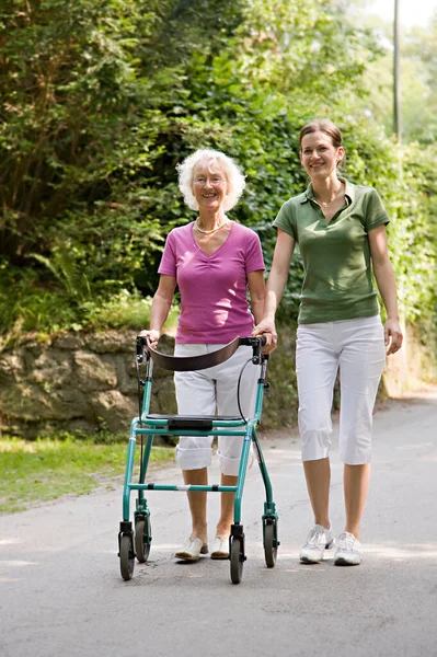 Woman Walking Senior Woman — Stock Photo, Image