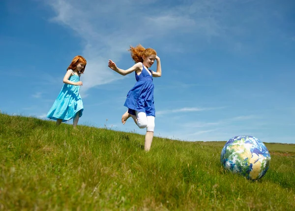 Young Girls Running Ball Globe — Stock Photo, Image