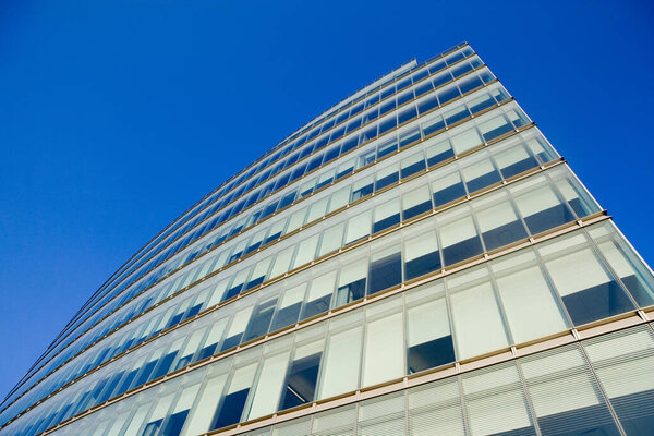 Modern office building over blue sky