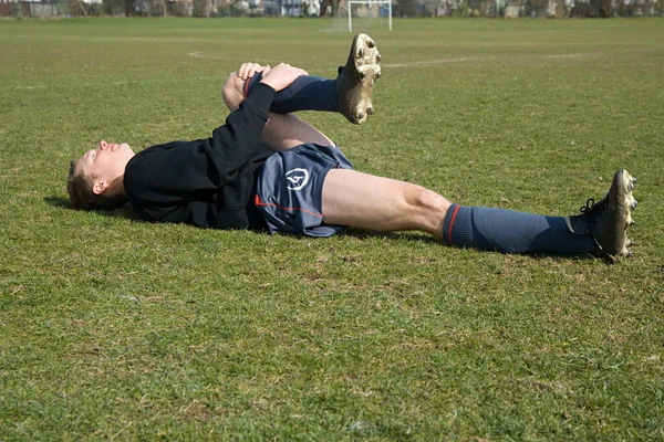 Injured Footballer Rolling Grass — Stock Photo, Image