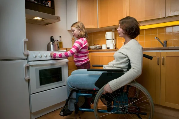 Disabled Mother Daughter Kitchen — Stock Photo, Image