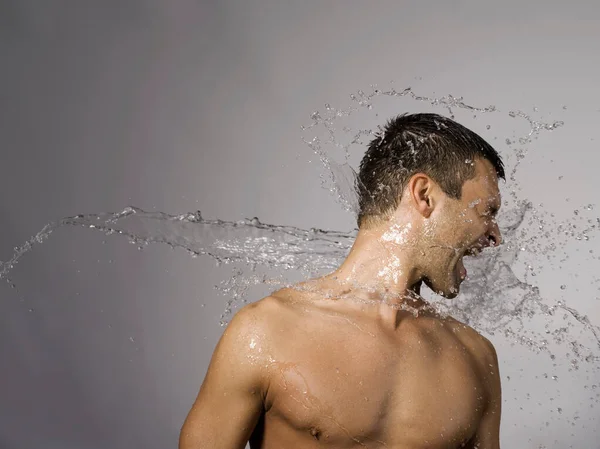 Man Splashed Water Royalty Free Stock Images
