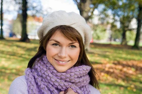 Woman in scarf and hat