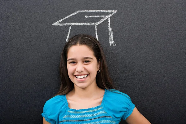 A girl with a chalk mortar board