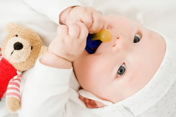 Baby Nibbling Pacifier — Stock Photo, Image