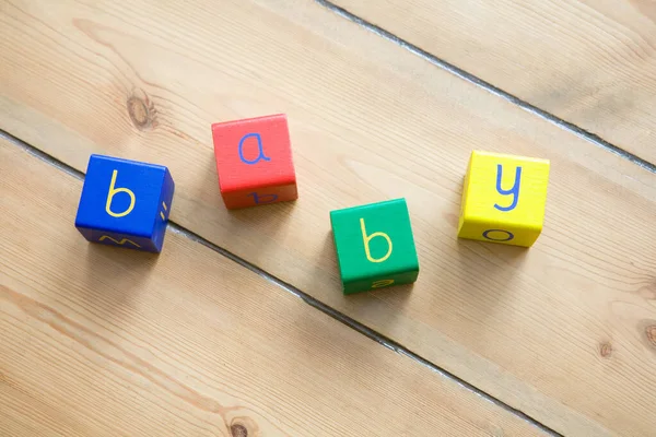Baby Spelled Out Building Blocks ストックフォト