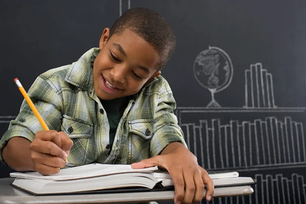 Boy Writing Notebook Royalty Free Stock Images