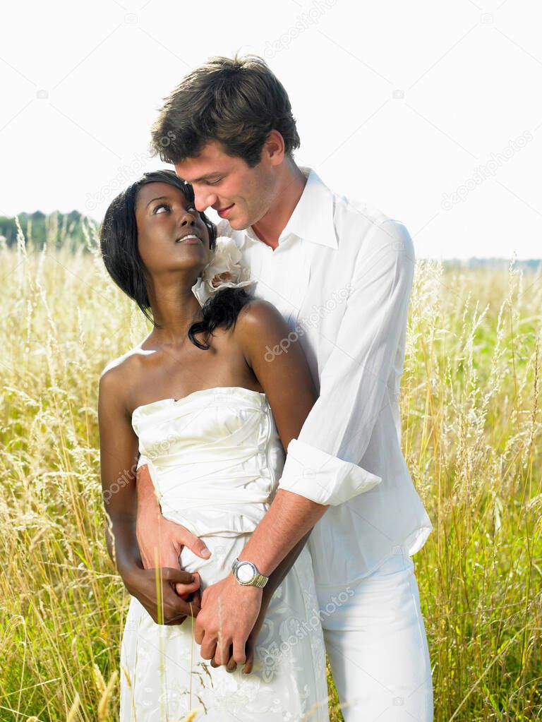 Married couple in a field