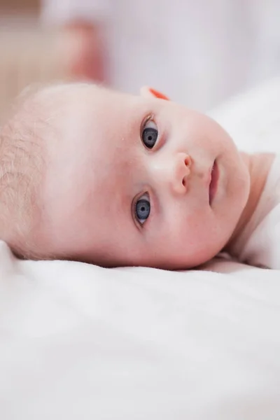 Baby Lying Bed Looking Viewer — Stock Photo, Image