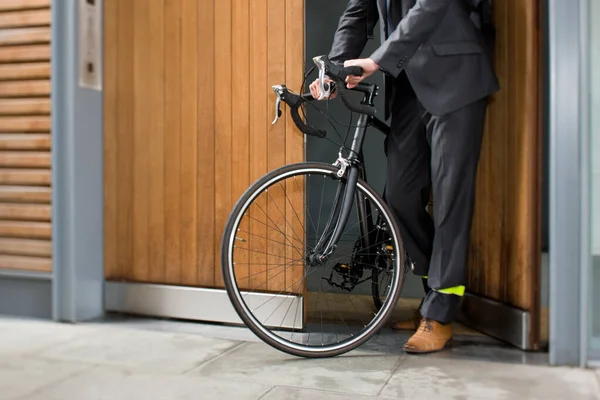 Cyclist Opening Wooden Door — Stok Foto