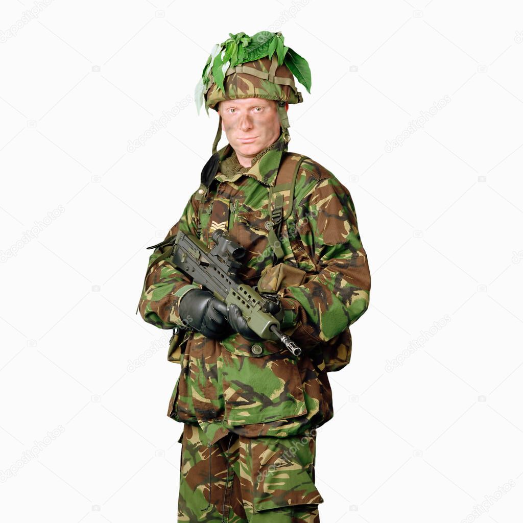 Soldier wearing camouflage on white background